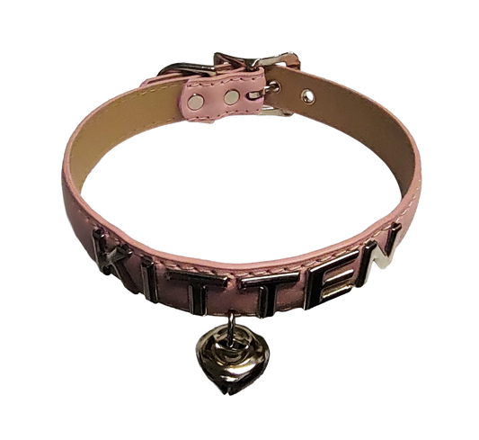 Pink faux leather collar with KITTEN letter studs and hanging bell top view
