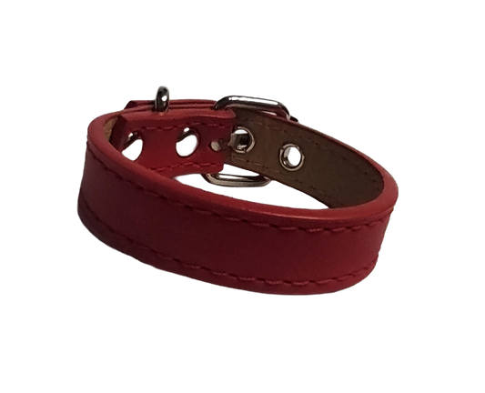 Red faux leather cuff bracelet with buckle and eyelets front view