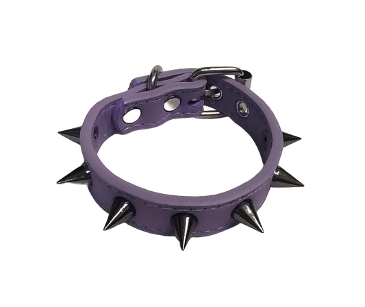 Pastel purple faux leather cuff bracelet with gunmetal spikes top view