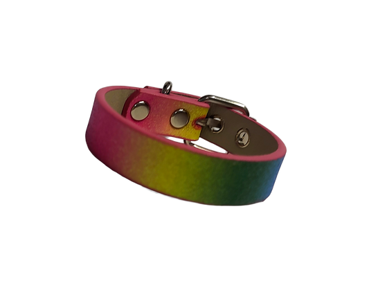 Glittery pastel rainbow faux leather cuff bracelet with buckle and eyelets front view