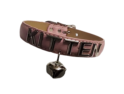 Pink faux leather collar with KITTEN letter studs and hanging bell front view