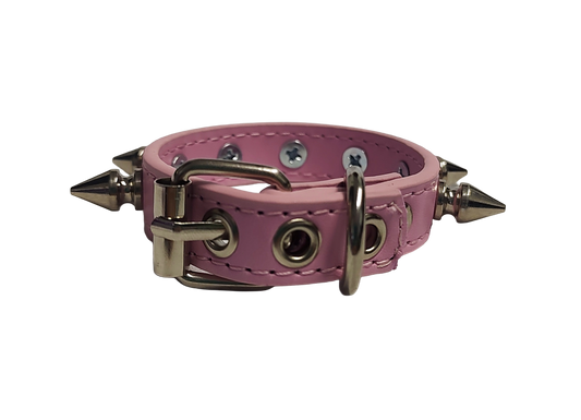 Pink faux leather spiked cuff bracelet back view