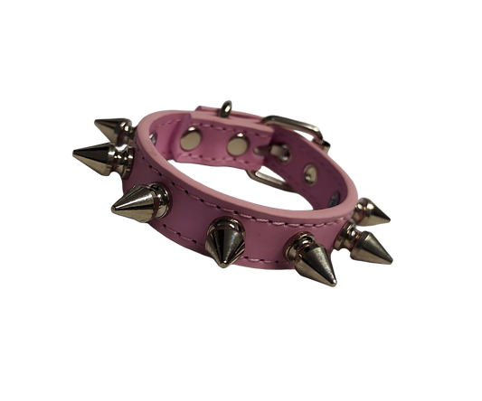 Pink faux leather spiked cuff bracelet front view