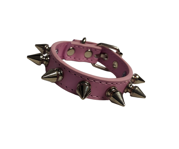 Pink faux leather spiked cuff bracelet front view