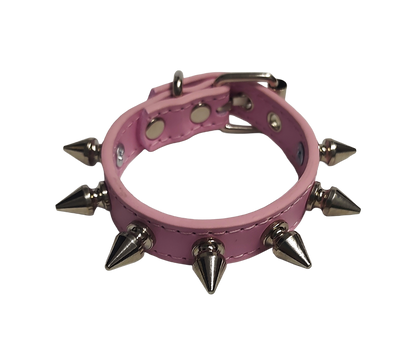 Pink faux leather spiked cuff bracelet top view