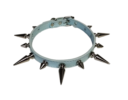 Ice blue faux leather spiked collar with alternating size tree spikes top view