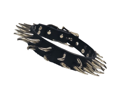 Black faux leather collar with two rows of cat claw spikes front view
