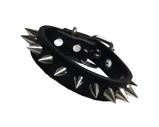 Black faux leather cuff bracelet with single row of cone spikes front view