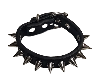 Black faux leather cuff bracelet with single row of cone spikes top view