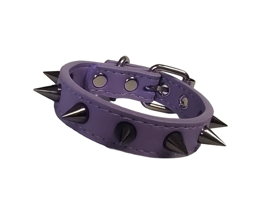 Pastel purple faux leather cuff bracelet with gunmetal spikes front view