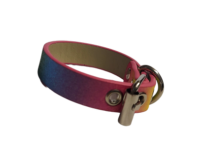 Glittery pastel rainbow faux leather cuff bracelet with buckle and eyelets left view