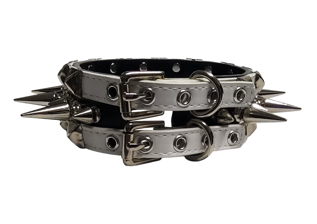 Black and white faux leather collar with alternating spikes and pyramid studs back view