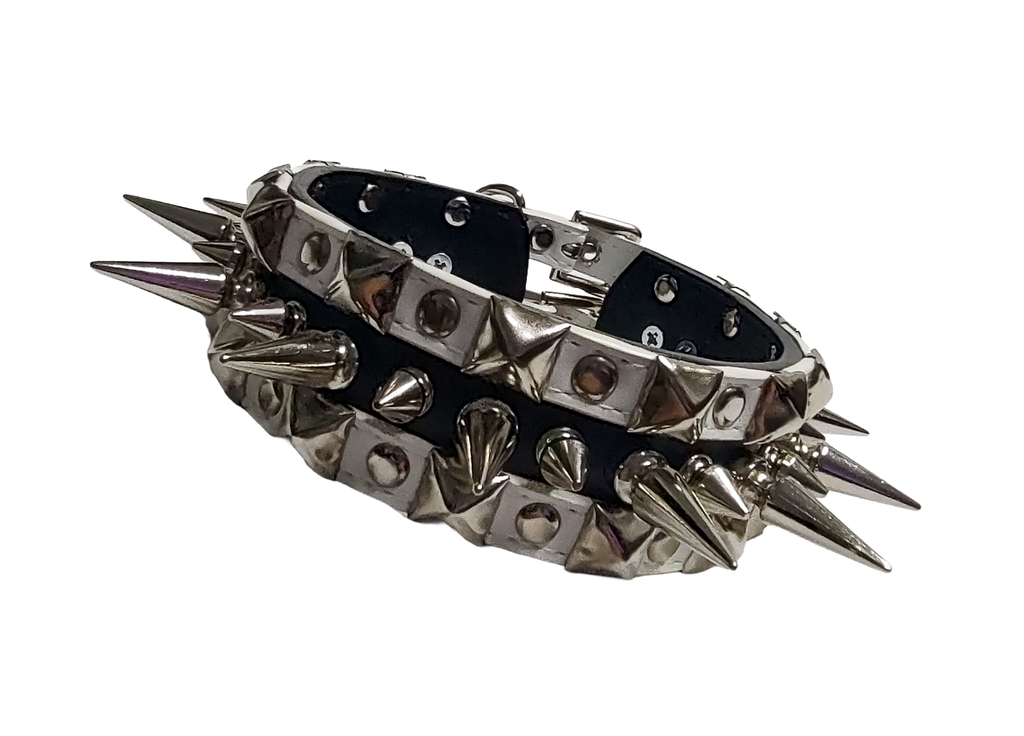 Black and white faux leather collar with alternating spikes and pyramid studs front view