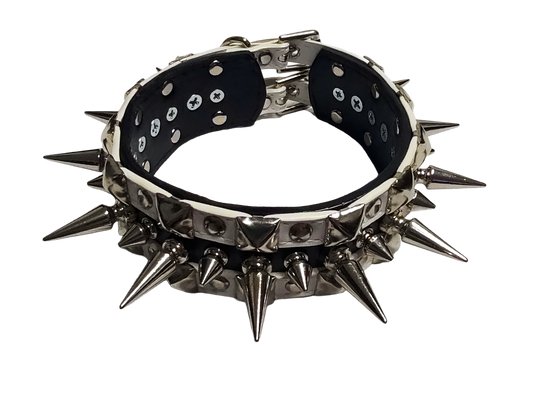 Black and white faux leather collar with alternating spikes and pyramid studs front top view