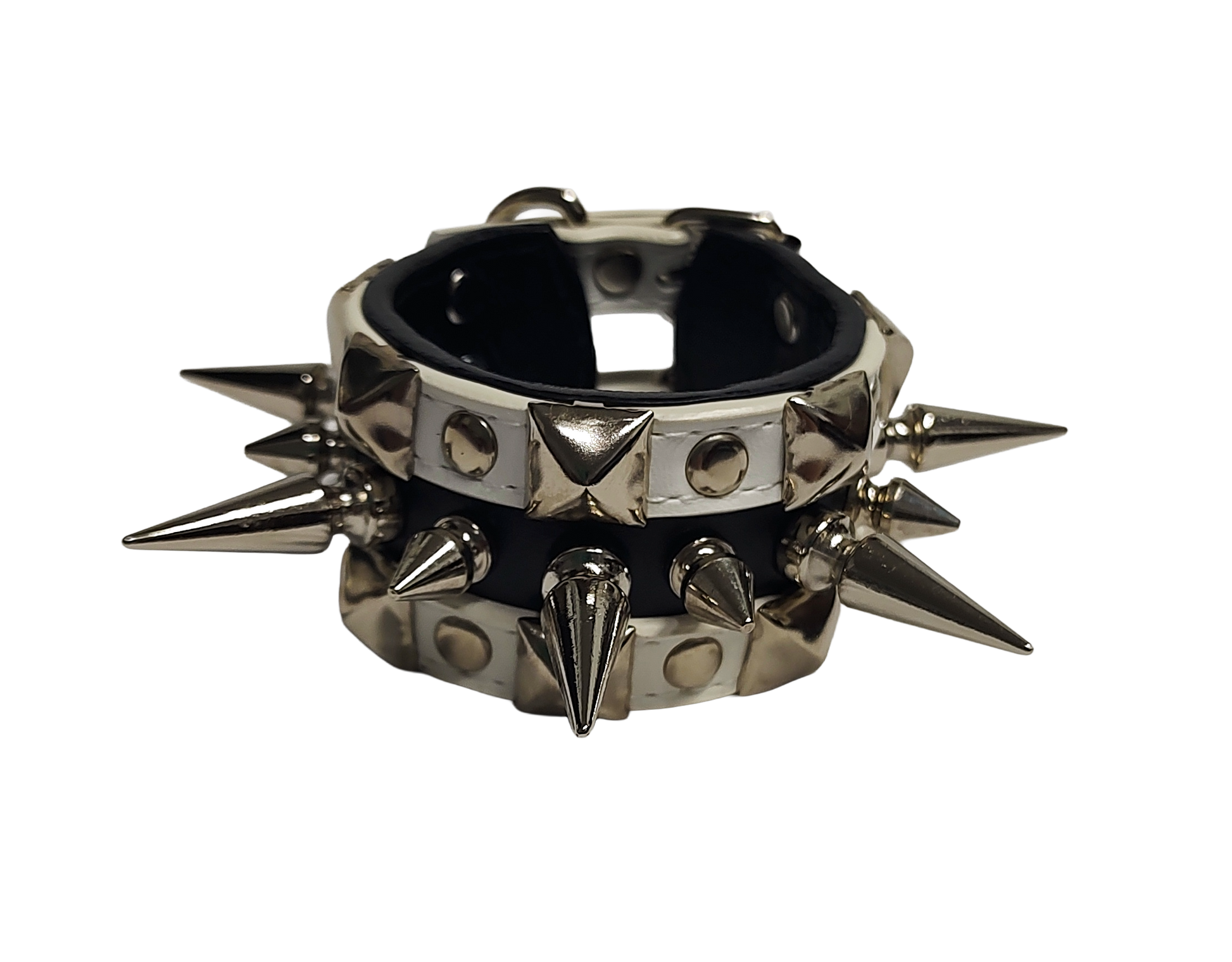 White and black faux leather cuff with alternating spikes and pyramid studs front view