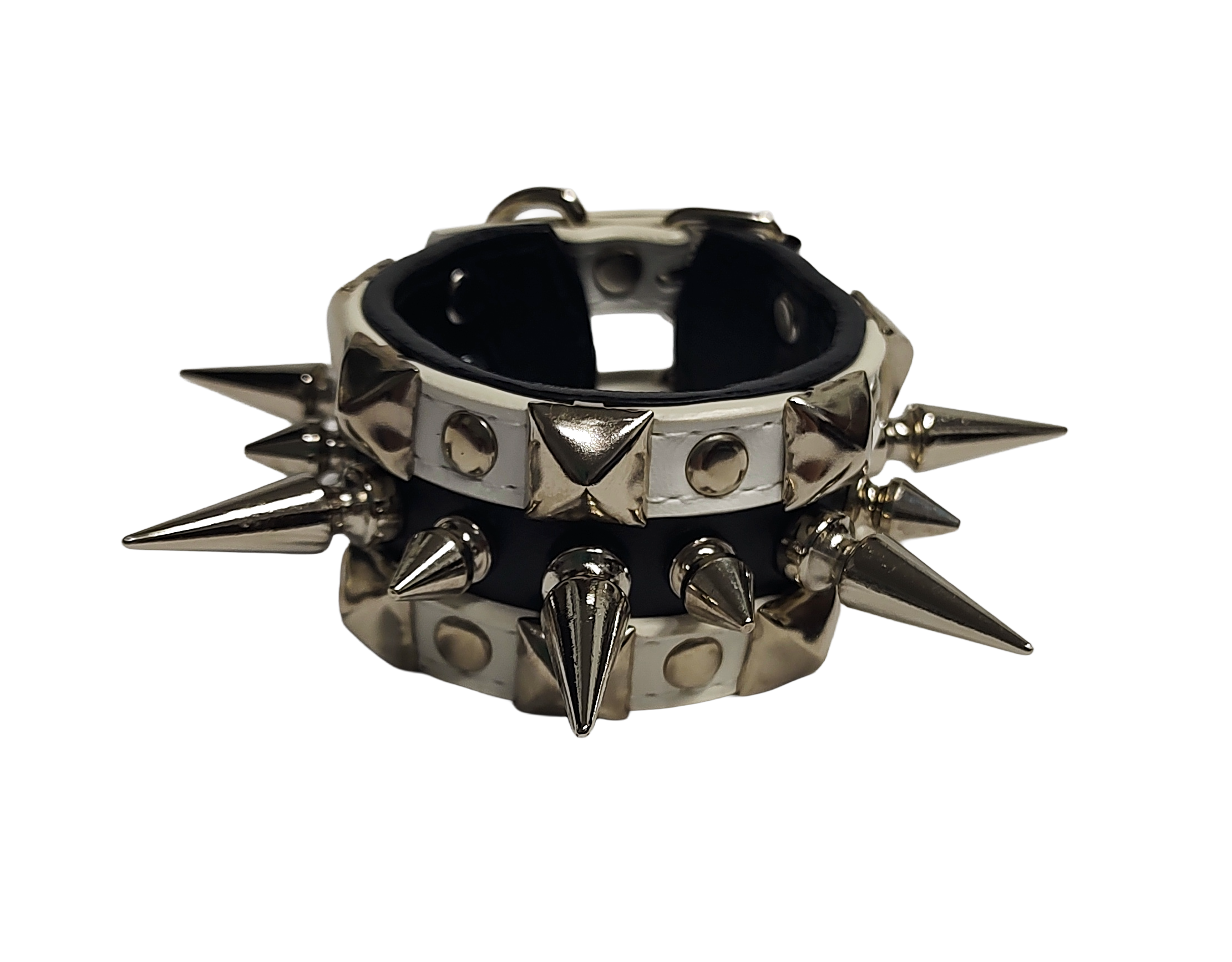 White and black faux leather cuff with alternating spikes and pyramid studs front view