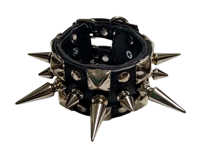 Black faux leather studded cuff with alternating tree spikes top front view