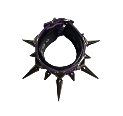 Purple and black faux leather cuff bracelet with alternating tree spikes rivets and pyramid studs top view