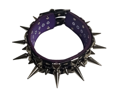 Black and purple faux leather collar with alternating spikes and pyramid studs top view