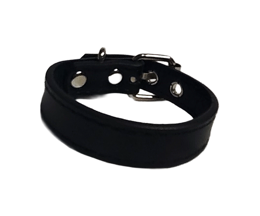 Black faux leather cuff bracelet with buckle and eyelets front view