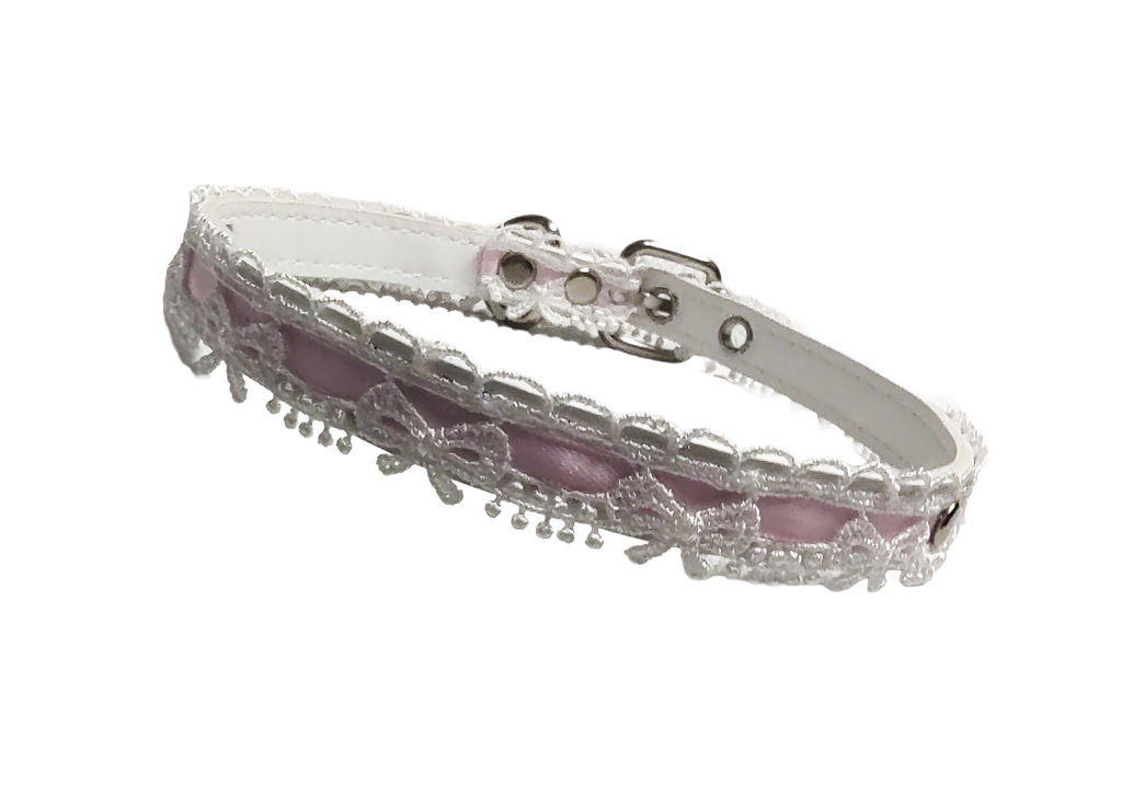 White faux leather and lace collar with pink ribbon and bow lace details front view