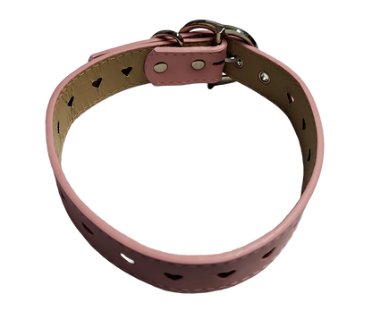 Pink faux leather collar with heart cut outs and heart shaped buckle top view