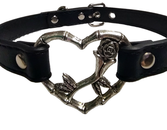 Black faux leather heart ring with rose detail collar close up view