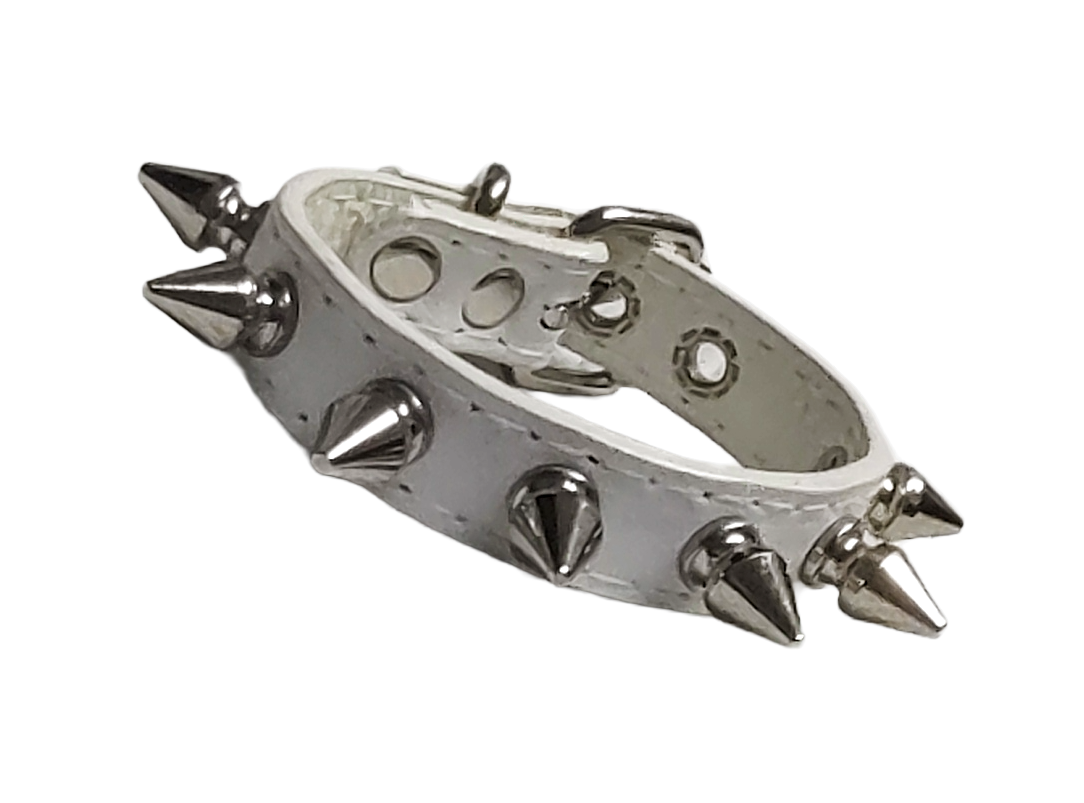 White faux leather spiked cuff with silver spikes front view