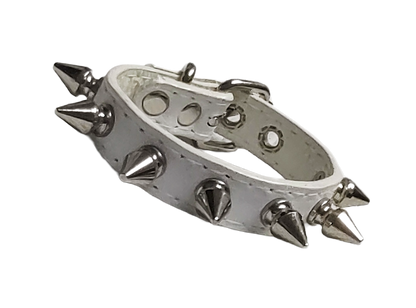 White faux leather spiked cuff with silver spikes front view