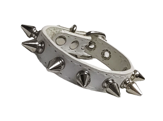 White faux leather spiked cuff with silver spikes front view