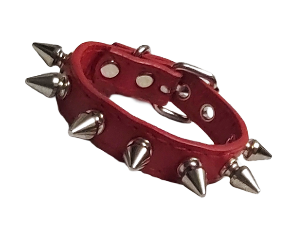 Red faux leather cuff with single row of spikes front view