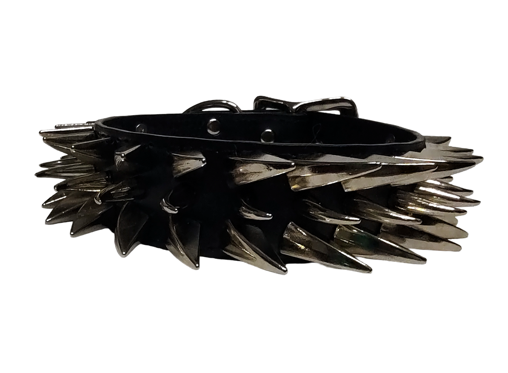 Black faux leather collar with two outer rows of dragon claw spikes and center row of cat claw spikes front center view