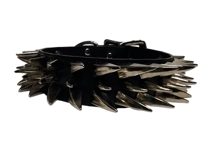 Black faux leather collar with two outer rows of dragon claw spikes and center row of cat claw spikes front center view