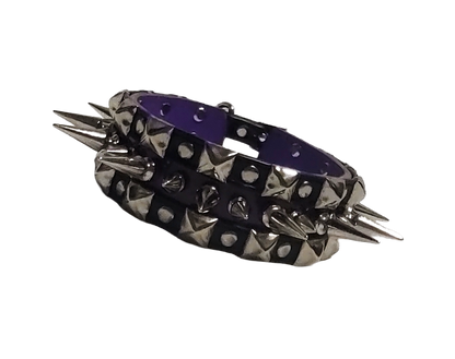Black and purple faux leather collar with alternating spikes and pyramid studs front view