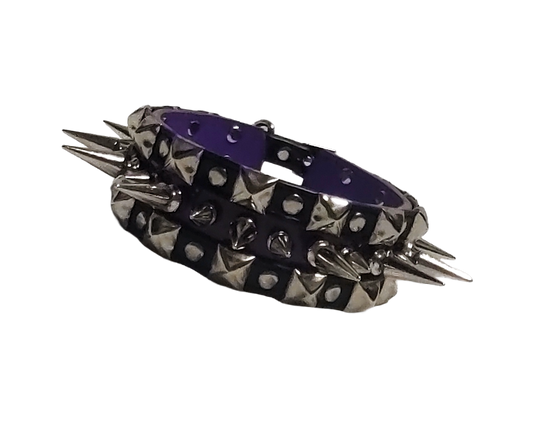 Black and purple faux leather collar with alternating spikes and pyramid studs front view