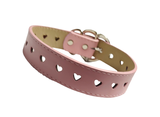 Pink faux leather collar with heart cut outs and heart shaped buckle front view