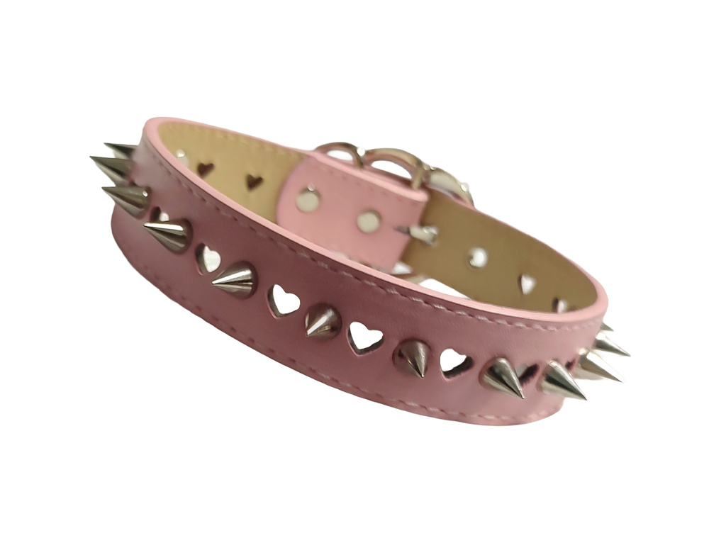 Pastel pink faux leather heart cut out collar with cone spikes and heart buckle front view