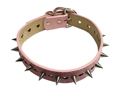 Pastel pink faux leather heart cut out collar with cone spikes and heart buckle top view